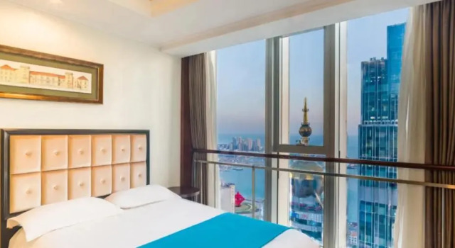 Люкс Superior с видом на море Qingdao Jinshan We+ Holiday Apartment (Wusi Square)