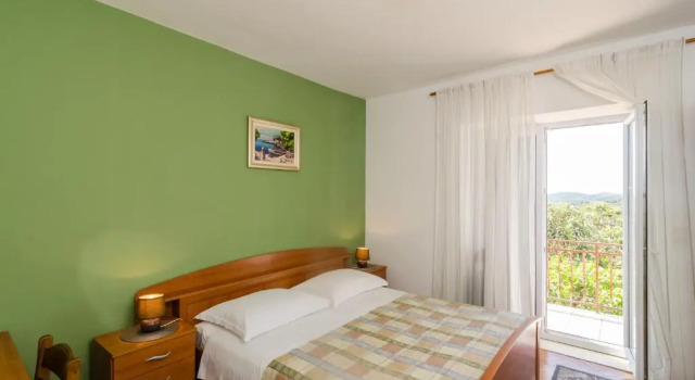 Люкс с 2 комнатами с балконом и с видом на море Guesthouse Moretić
