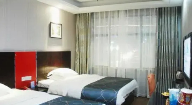 Mingcheng Marriott Business Hotel, Rezervovat Hotel Xiangyang Čína