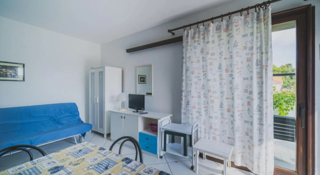 Porto 7B in a panoramic position with pool above the town of Porto Azzurro-IL PORTO CASA LEO, Book Hotel Porto Azzurro Elba