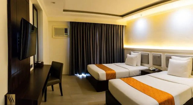 Четырёхместный номер Deluxe Sotogrande Iloilo Hotel