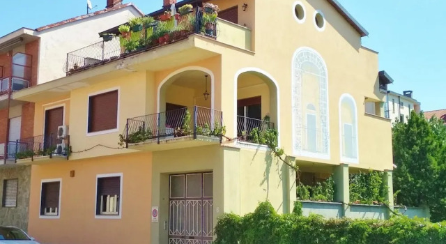 Casa con giardino