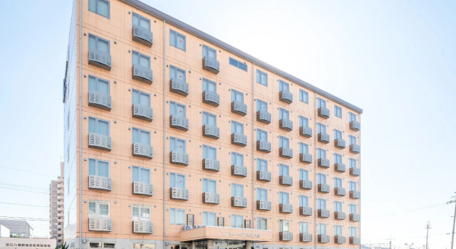 Кровать в общем номере Comfort Inn Omihachiman