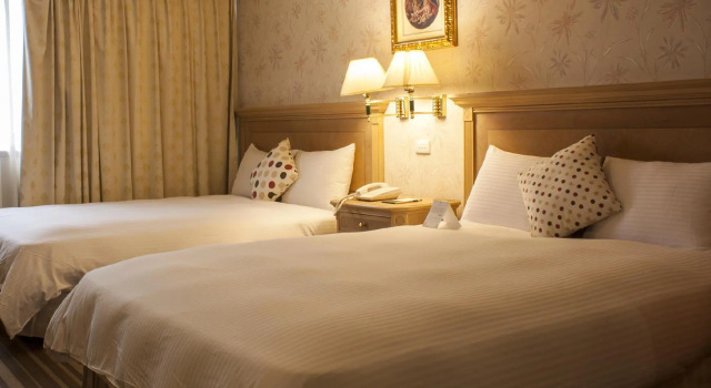 Четырёхместный номер Deluxe Cambridge Tainan Hotel