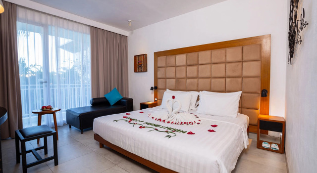 Номер Deluxe с видом на бассейн Отель The 101 Bali Fontana Seminyak