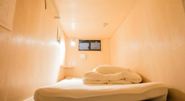 Кровать в общем номере Cafe & Guest House Nagonoya
