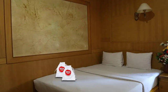 NIDA Rooms Makassar Savu, Rezervovat Hotel Hotely v Sulawesi s parkováním, Parkování