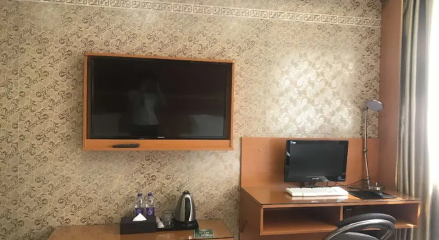 Номер Deluxe Guangzhou Meiling Hotel