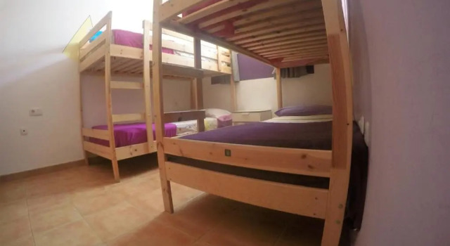Кровать в общем номере La Fresa Guest House Corralejo