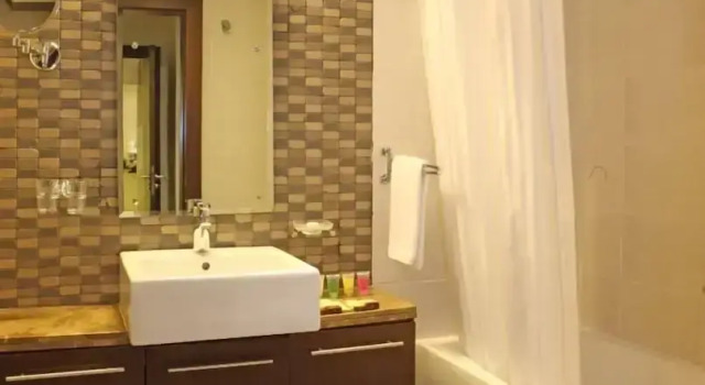 Апартаменты First Royal Hotel Apartment