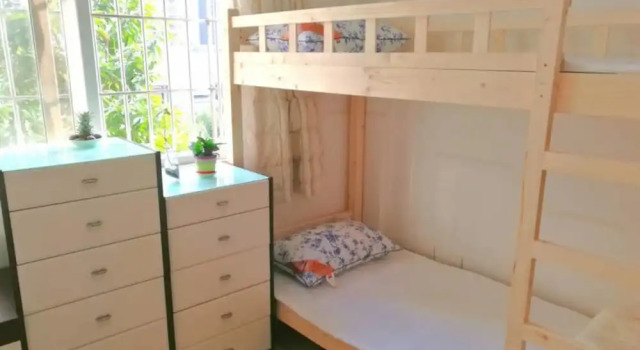 Кровать в общем номере Laiyin Garden City Hostel