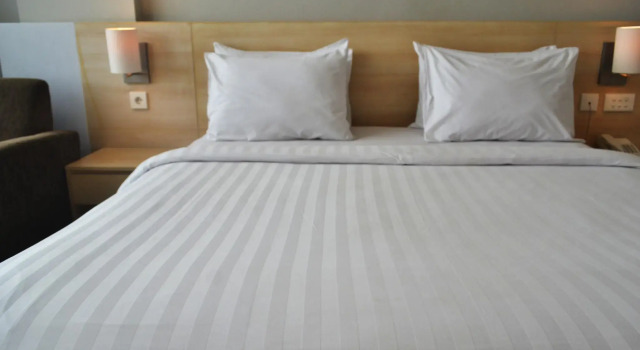 Standard Casal Clube quarto Horison Ultima Malang