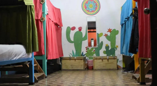 Кровать в общем номере Sukha Hostel San Luis