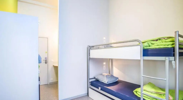 Кровать в общем номере Auberge de Jeunesse de Tournai - Youth Hostel