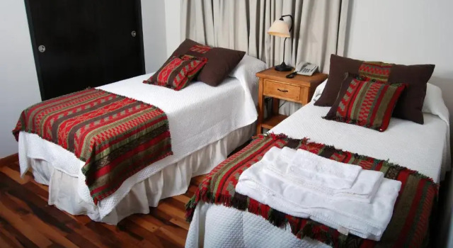 Rio Arriba Suites Apartments y Resto