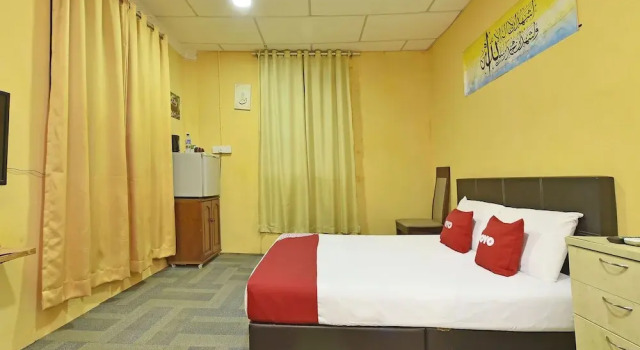 Номер Premium OYO 90535 Wakaf Bharu Inn