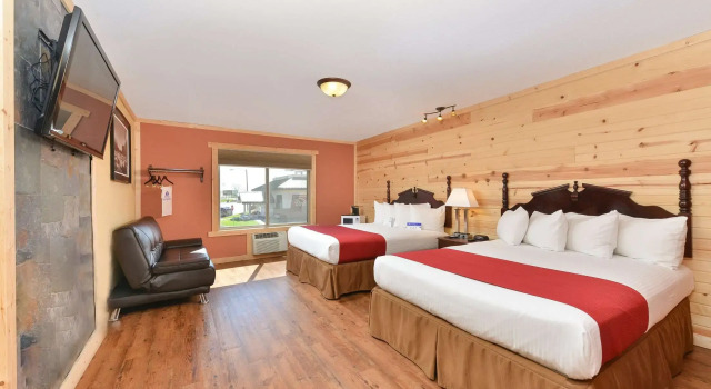Четырёхместный номер Standard Americas Best Value Inn Wall