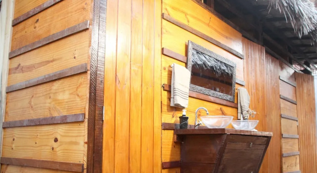 Кровать в общем номере Raiz Hostel