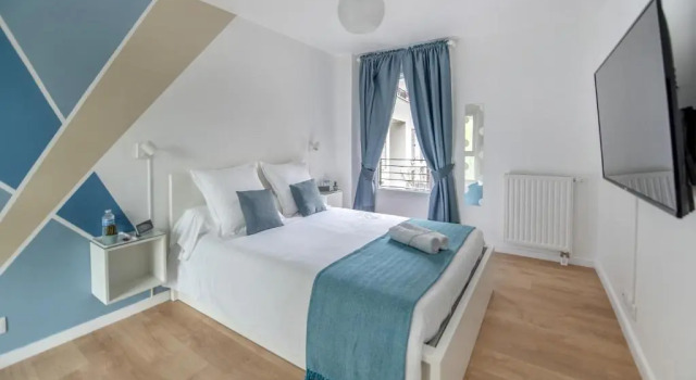 Апартаменты Appartement de 4 chambres à 13 minutes de Paris (train)
