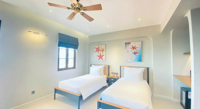 Двухместный номер Deluxe с балконом и рядом с пляжем Lucie Cozy Home - Sunset Town Phu Quoc