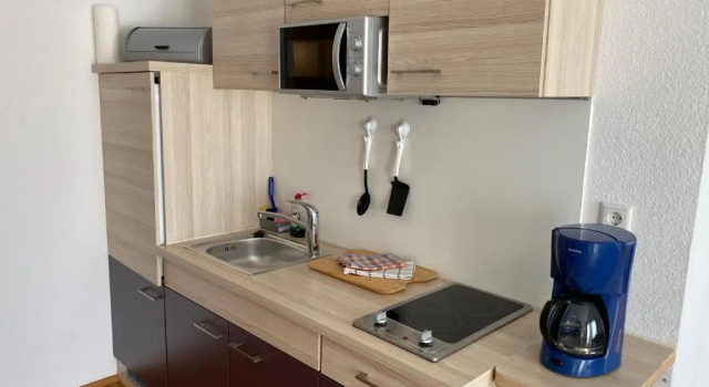 Студия Apartmenthaus Zentrum Komfort Apartments mit Miniküchen verschiedener Größen