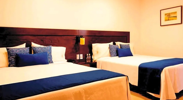 Четырёхместный номер Deluxe Hotel Real Alma