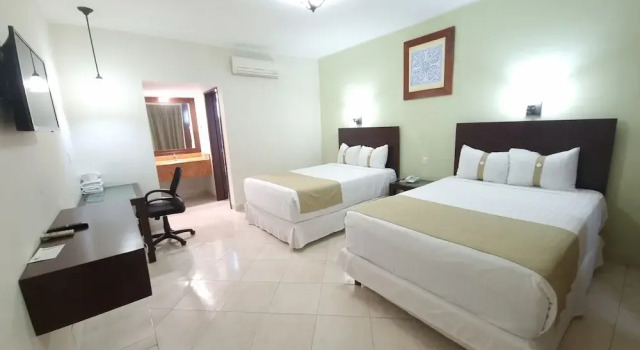 Четырёхместный номер Deluxe с видом на сад Hotel Casa Blanca