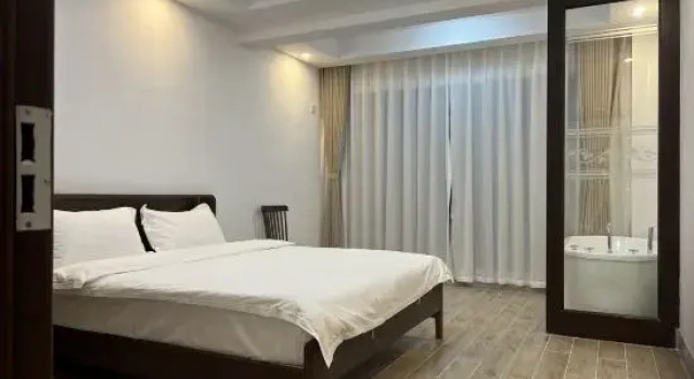 Люкс с 2 комнатами с красивым видом из окна Tengchongxi Water Garden Hot Spring Homestay