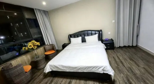 Кровать в общем номере Yueshan Tinghai B&B