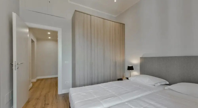 Кровать в общем номере с 6 комнатами с балконом Santa Croce Terrace Deluxe