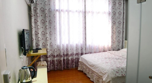 Aiqinhai Fashion Hotel