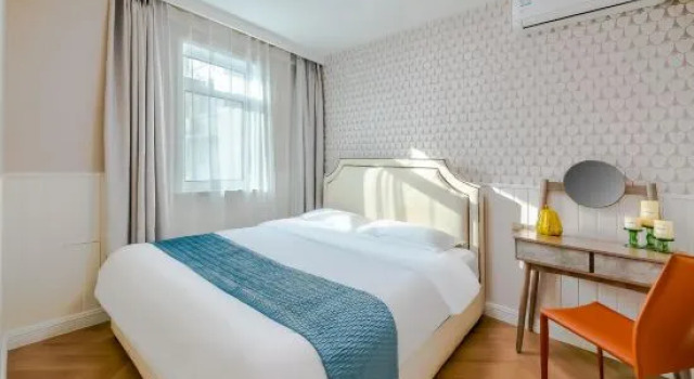 Кровать в общем номере Miomi Homestay