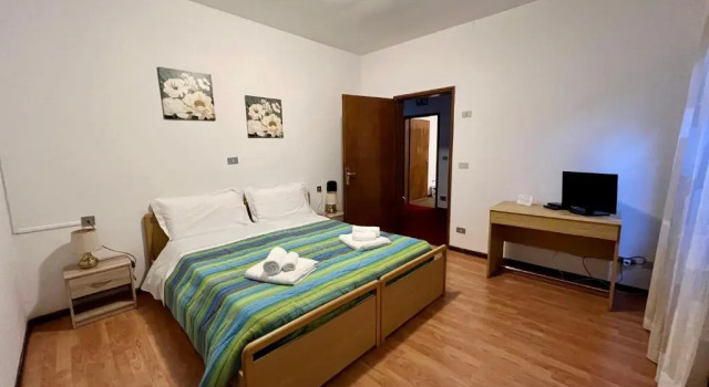 Четырёхместный номер Economy Hotel TEA DOLOMITI - Lago di Alleghe - Monte Civetta
