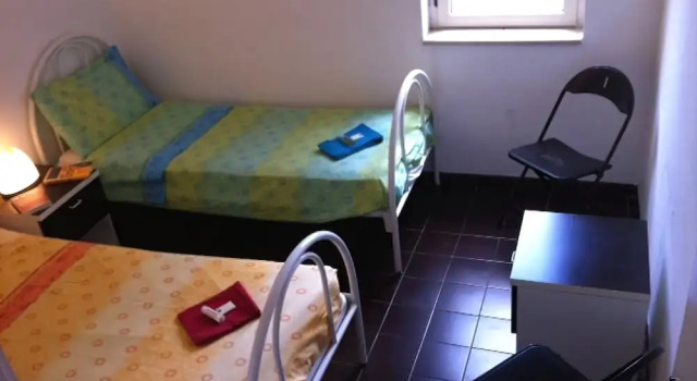 Guest House Mikonos, Забронировать Гостевой дом Отели Катандзаро-Лидо с парковкой, Парковка