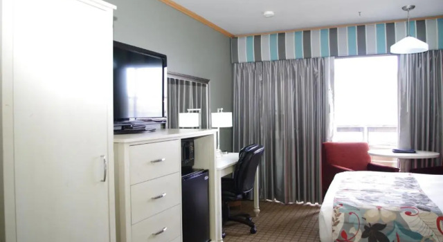 Четырёхместный номер Deluxe с видом на реку River House Inn, a Baymont by Wyndham