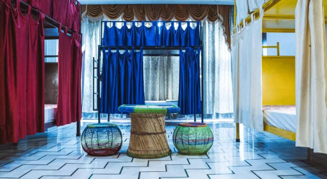 Кровать в общем номере Le Fort Homestay