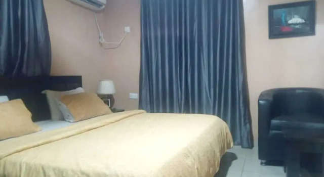 Апартаменты StayCation Suites And Apartment