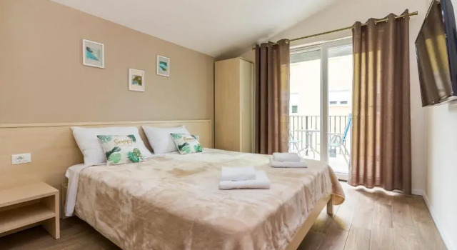 Апартаменты с 2 комнатами с балконом и с видом на море Apartments Villa Nina
