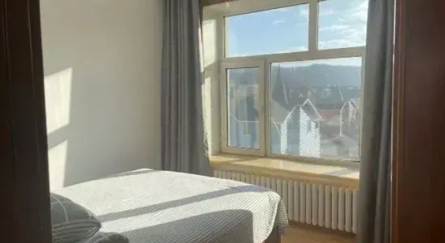 Кровать в общем номере с 3 комнатами Yabuli Qingyun County Xin Ding Apartment Hotel