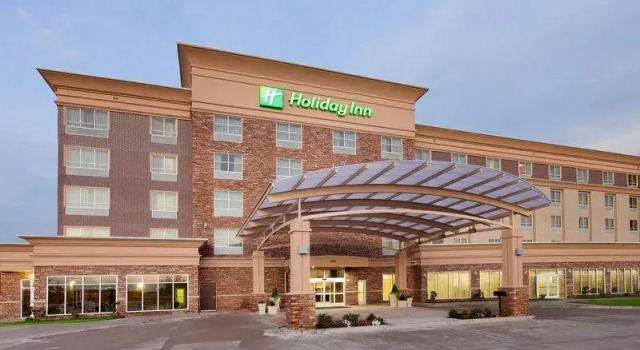 Кровать в общем номере Holiday Inn Garland by IHG