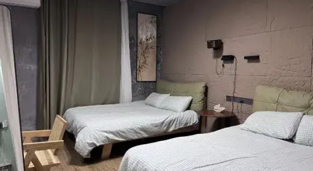 Cama en dormitorio compartido PingTan Suse