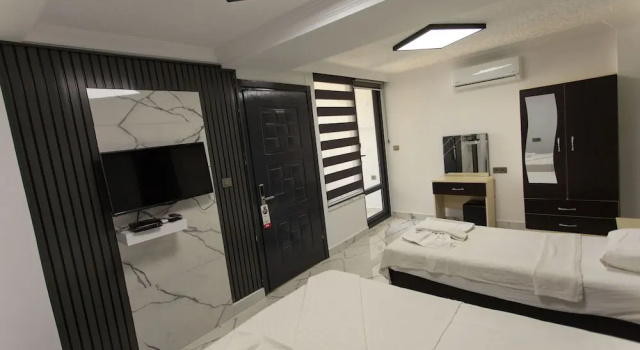 Трёхместный семейный номер Standard Green Peace Hotel