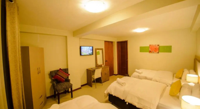 Habitación triple De lujo Wayta Inn