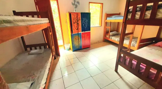 Кровать в общем номере Multiverso Hostel