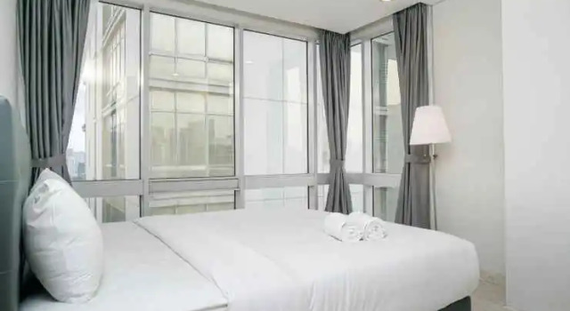2BR Cozy at Empyreal Epicentrum Apartment By Travelio