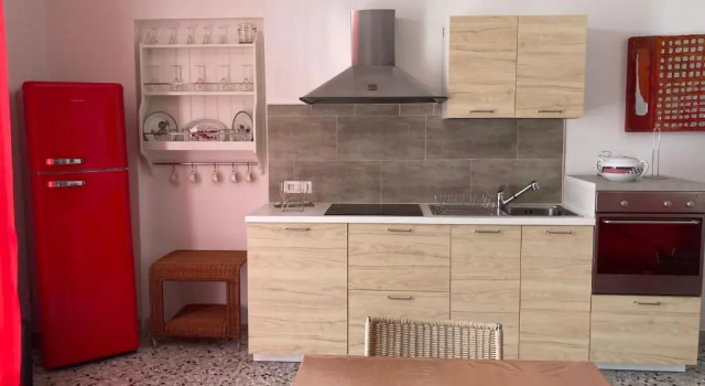 Коттедж Casa vacanze Acchiappasogni rosso