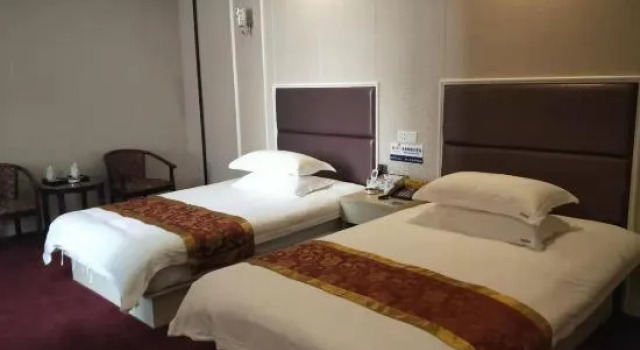 Трёхместный люкс Xinrui Business Hotel