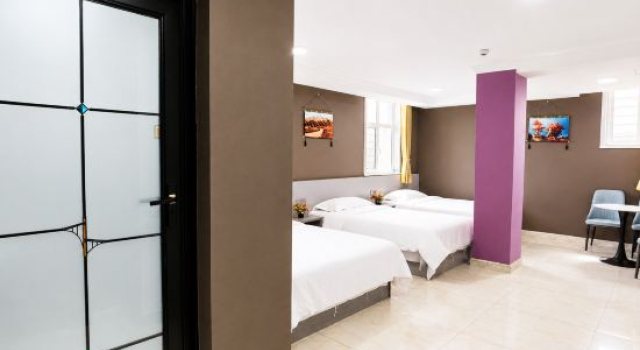 Кровать в общем номере Xiangxiang Homestay (Yining Airport Railway Station)