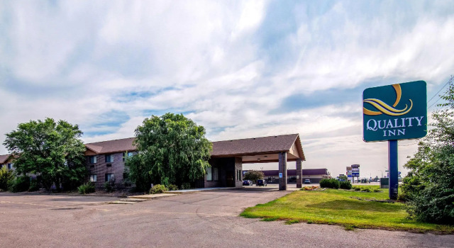 Кровать в общем номере Quality Inn Aberdeen