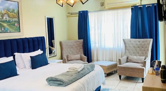 Номер Classic Henry George Hotel